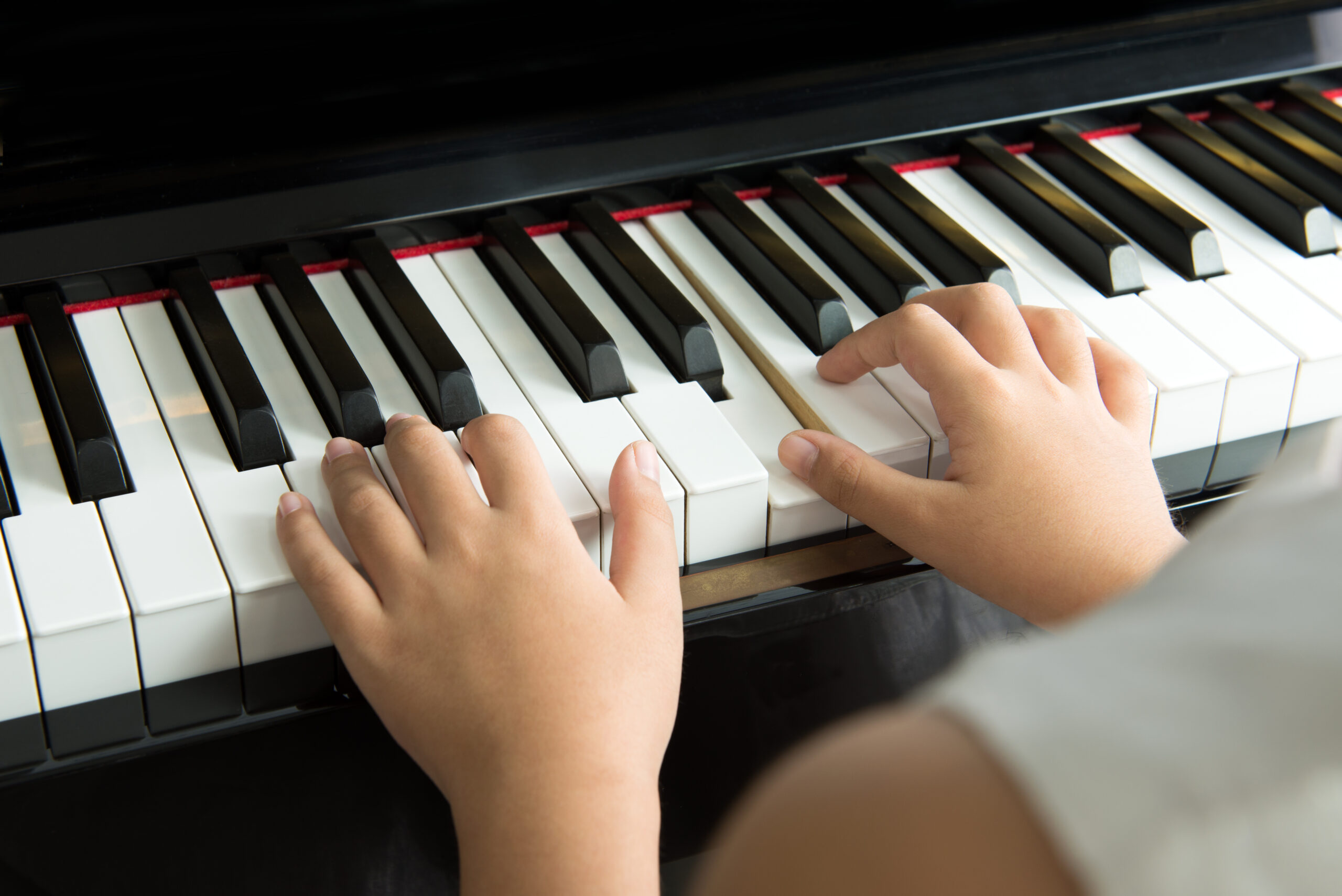Little girl playing piano